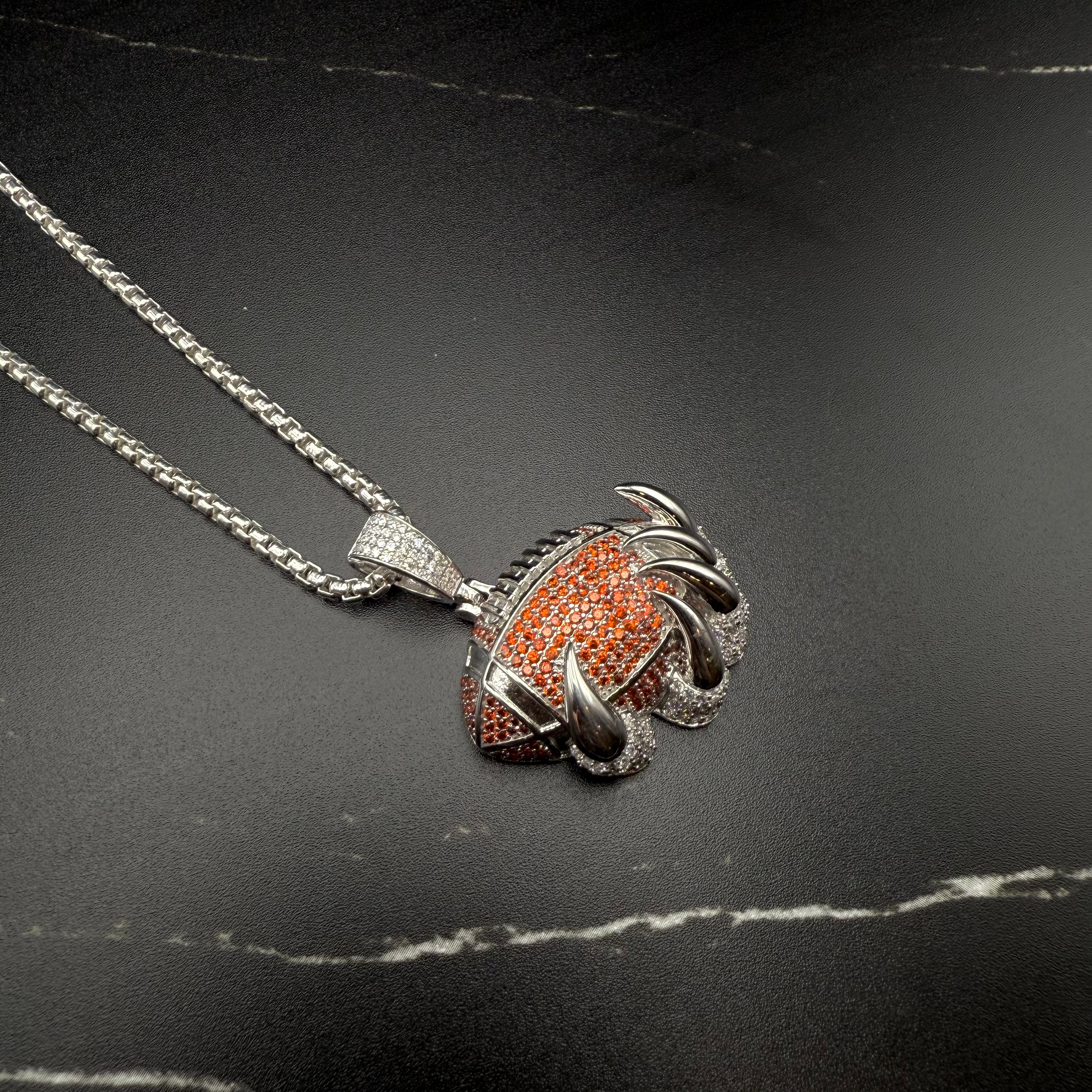 Claw Football Pendant – Premium Clear & Orange CZ – Sterling Silver