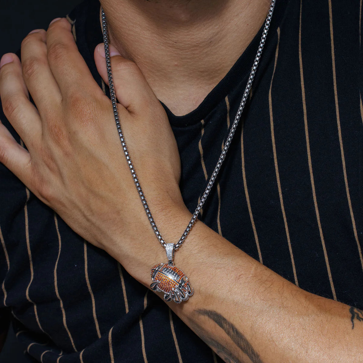 CLAW FOOTBALL CLEAR AND ORANGE CZ PENDANT - sterling silver